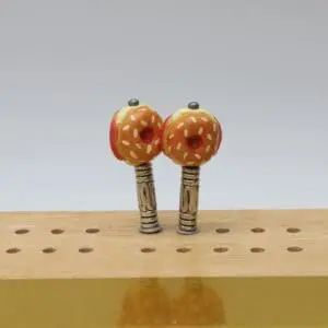 Fun Bagel Sandwich Cribbage Pegs featuring miniature bagel sandwiches with detailed layers of toppings and fillings, designed to add a playful foodie touch to your cribbage board game.
